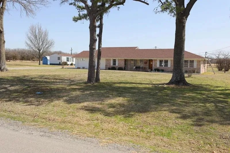 Homestead with pond and greenhouse 11.29 acres featured image
