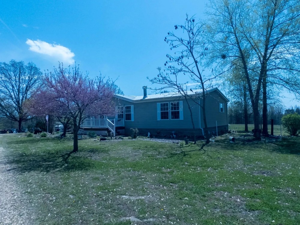 Country Homestead On Mostly Wooded Tract With Some Pasture featured image