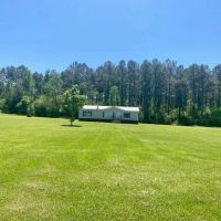 58 acres pasture and homes Mt Herman Road images 4