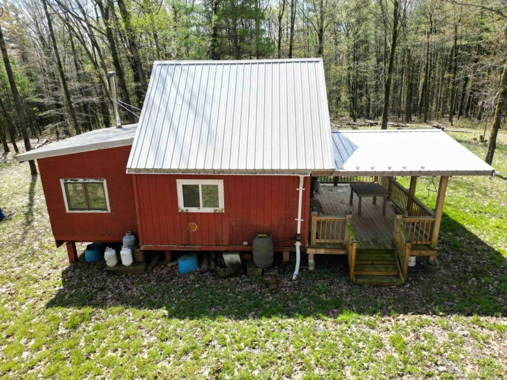 5 acres Off Grid Cabin bordering State Land near Keuka Lake in Hammondsport NY 8051 Kane Rd featured image