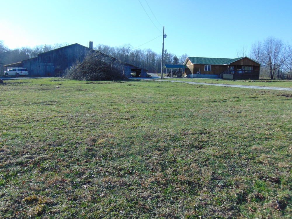 Home with 75 acres…3 bedroom  2 bath 2 fully stocked ponds fenced  pasture land  timber and much more. featured image