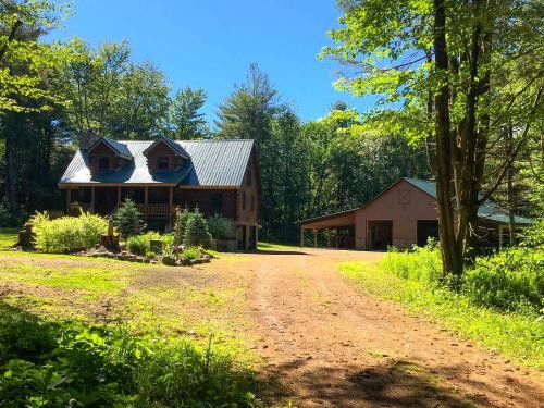 80 acres Magnificent Log Home in Williamstown featured image