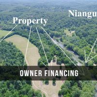 OWNER FINANCED 10 Acres with River Frontage