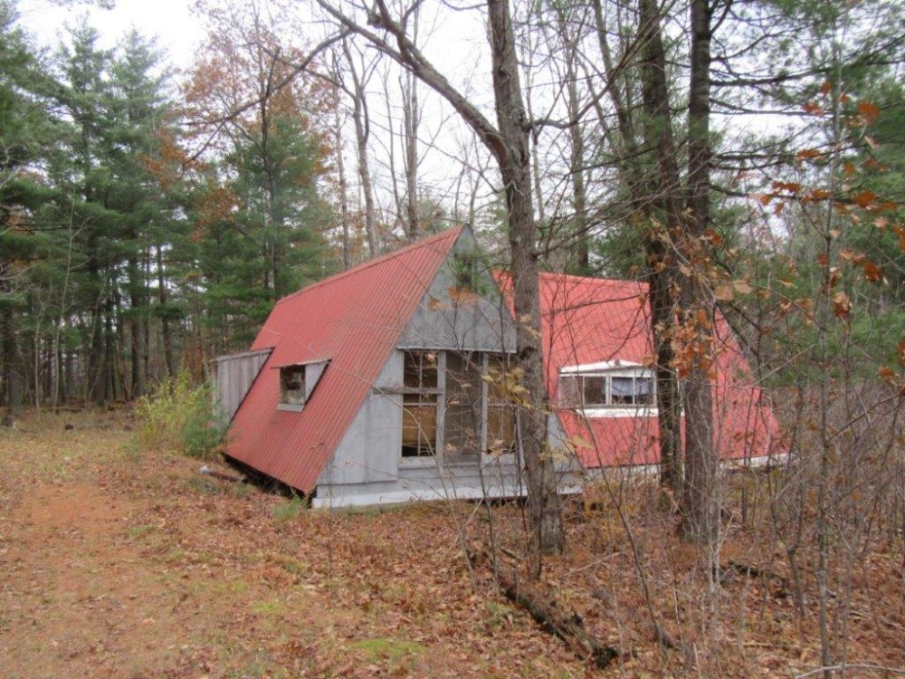 58 acres Hunting Camp and Pond near Trout Lake featured image