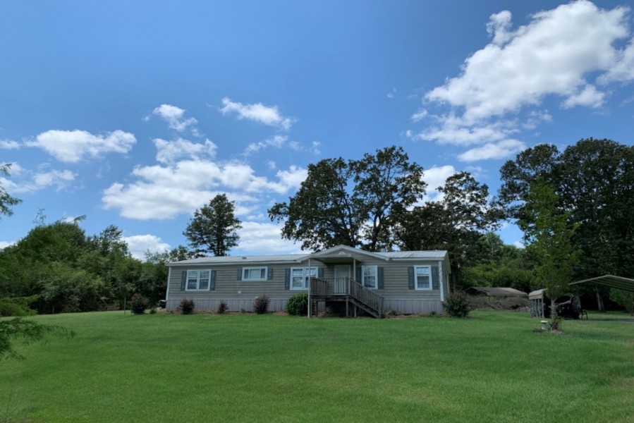 50 Acres with a Home in Pike County at 4199 Emerald Stateline Road in Magnolia  MS featured image