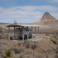 20 acres  nice terrain and large carport