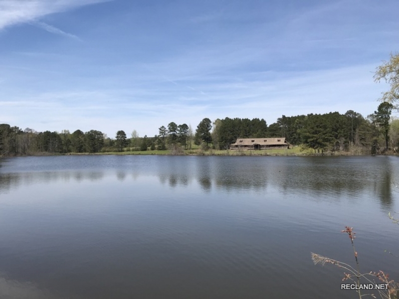 243 ac - Timberland with Buildings  Lake and Lots of Uses - REDUCED featured image