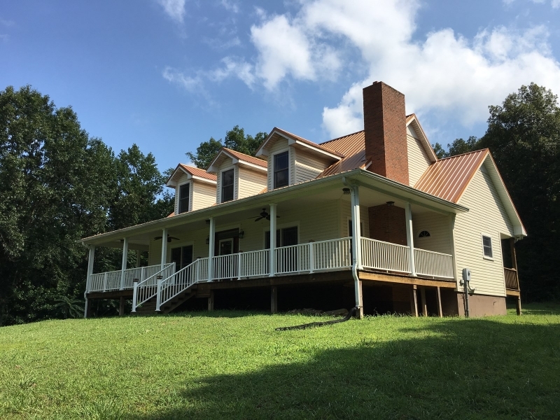 Private Country Home with Wooded Acreage For Sale in Tompkinsville  KY featured image
