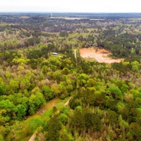 7.7 Acres Woodville Texas Homesite with Utilities AND Running Creek  10k Down images 2