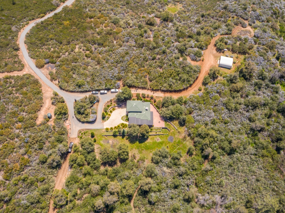 Secluded Retreat on 93 &nbsp; - Acres of Mountain Beauty  with Charming 1200esf Custom House featured image
