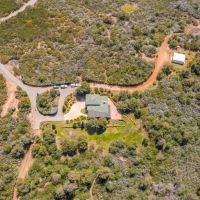Secluded Retreat on 93 - Acres of Mountain Beauty with Charming 1200esf Custom House images 2