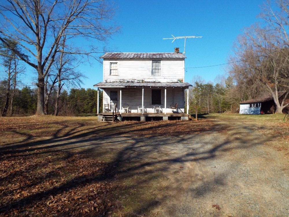 60.86 Acres Open Fields Planted Pines Road Frontage Farm House featured image