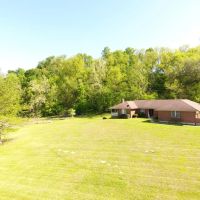 80 Acres w Home 6 Acre Lake