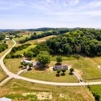 63 Unrestricted Acres on a Creek with 2 Homes images 2