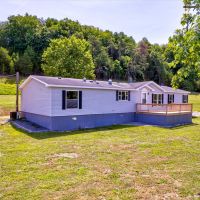63 Unrestricted Acres on a Creek with 2 Homes images 4